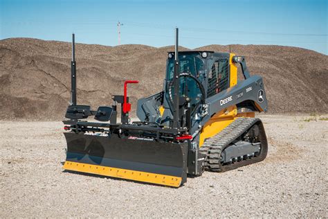 adding fill dirt with a skid steer|skid steer grading equipment.